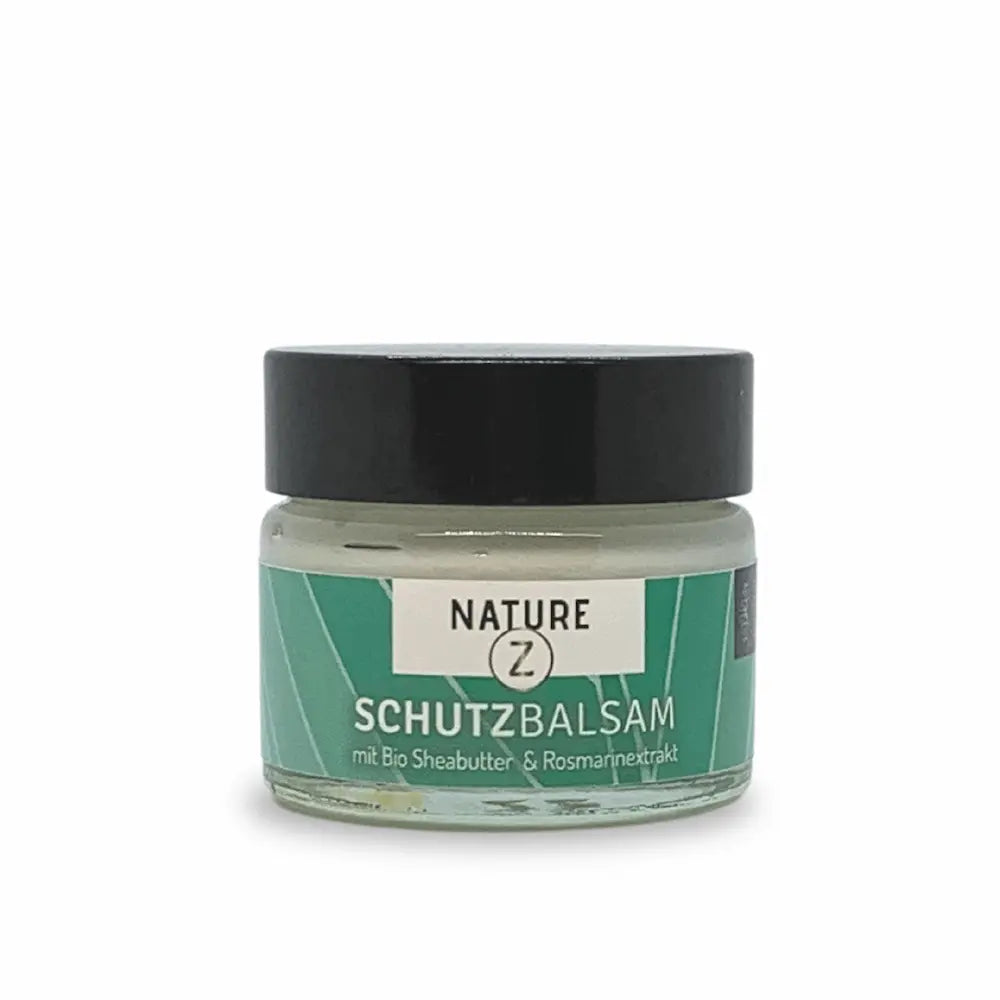 Nature Z Schutzbalsam im Glastiegel mit schwarzem Deckel, grünem Etikett und Aufschrift „mit Bio Sheabutter & Rosmarinextrakt“.