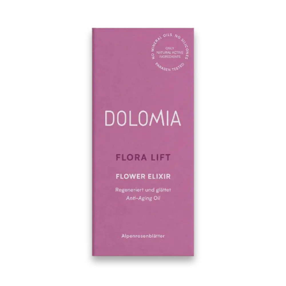 Pinke Faltschachtel Dolomia Flora Lift Flower Elixir Anti-Aging Oil mit Alpenrosenblättern, Vorderansicht