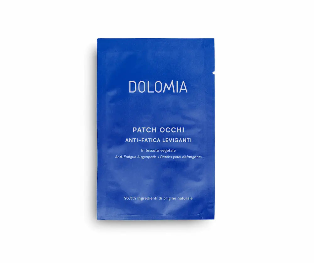 Blaues Dolomia Sachet mit Anti-Fatigue Augenpads aus pflanzlichem Vlies, Aufschrift Patch Occhi Anti-Fatica Leviganti.
