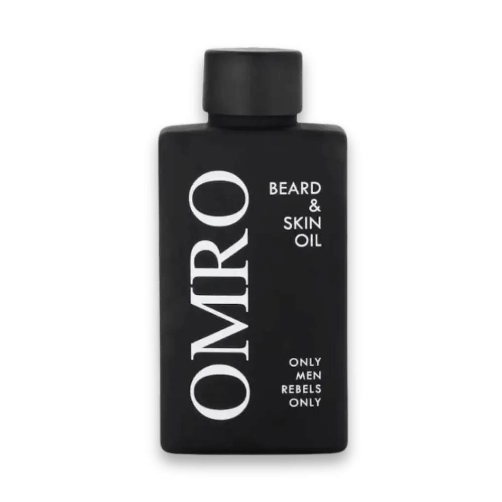 OMRO Beard & Skin Oil in schwarzer, rechteckiger Flasche mit schwarzem Deckel und weißer Aufschrift „Only Men Rebels Only“, Vorderansicht.