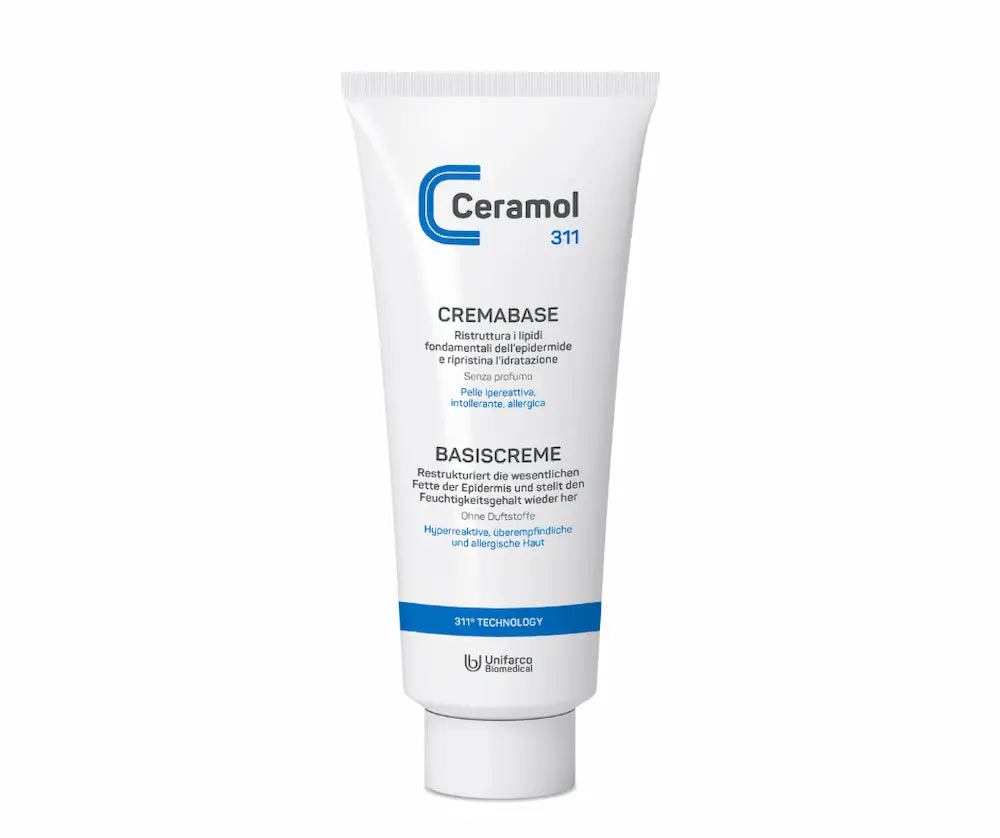 Ceramol 311 Cremabase Basiscreme in weißer Tube mit blauem Logo, stehend auf der Verschlusskappe, für hyperreaktive und allergische Haut