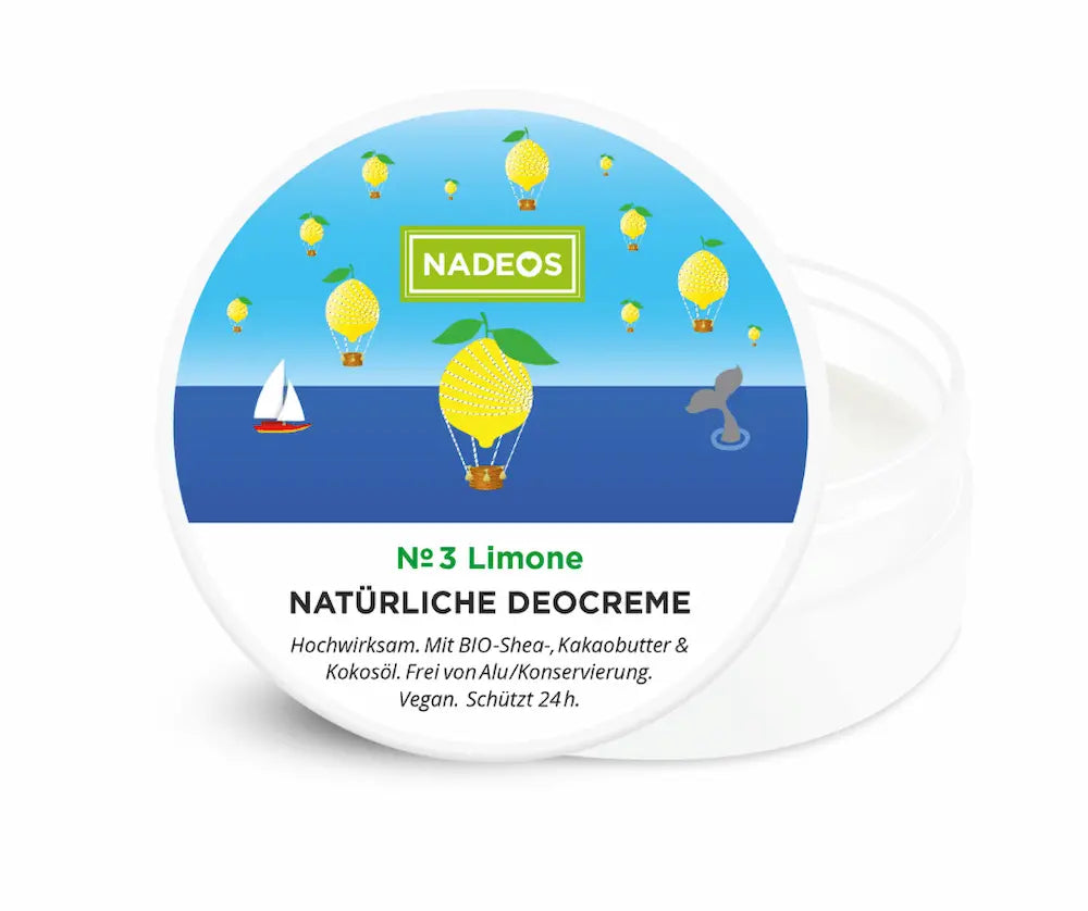 Geöffnete runde weiße Dose NADEOS Natürliche Deocreme N°3 Limone mit Zitronen-Heißluftballon-Motiv und sichtbarer weißer Creme