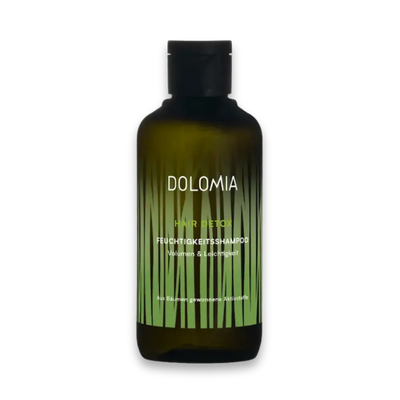 Dolomia Hair Detox Feuchtigkeitsshampoo für Volumen und Leichtigkeit in grüner Flasche mit Grasmotiv, Vorderansicht