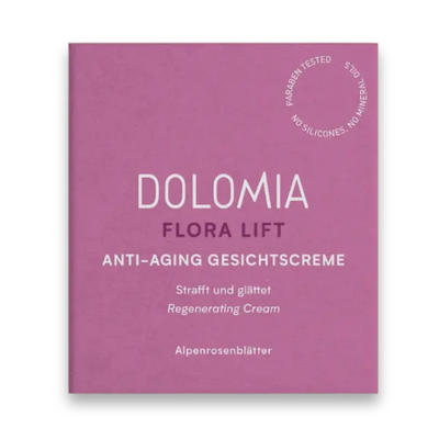 Dolomia Flora Lift Anti-Aging Gesichtscreme in beerefarbener Faltschachtel, Vorderansicht mit Hinweis „Strafft und glättet" und Alpenrosenblätter