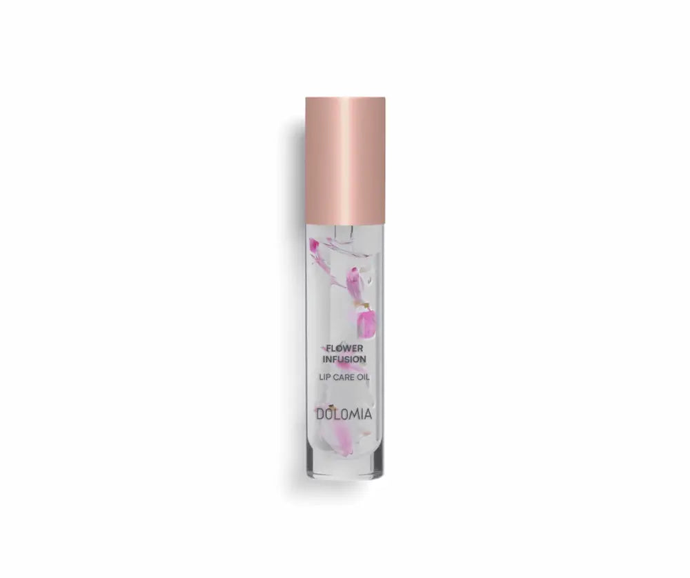 Dolomia Flower Infusion Lip Care Oil in transparenter Flasche mit rosa Blütenblättern und roségoldenem Verschluss, Vorderansicht