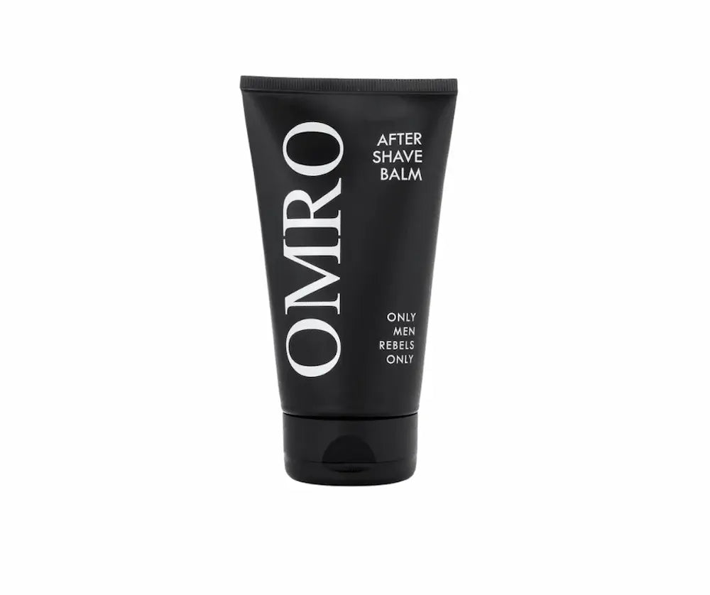 OMRO After Shave Balm in schwarzer Tube mit weißer Aufschrift und Slogan „Only Men Rebels Only“, Vorderansicht.