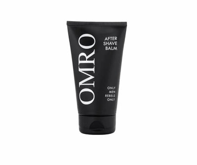 OMRO After Shave Balm in schwarzer Tube mit weißer Aufschrift und Slogan „Only Men Rebels Only“, Vorderansicht.