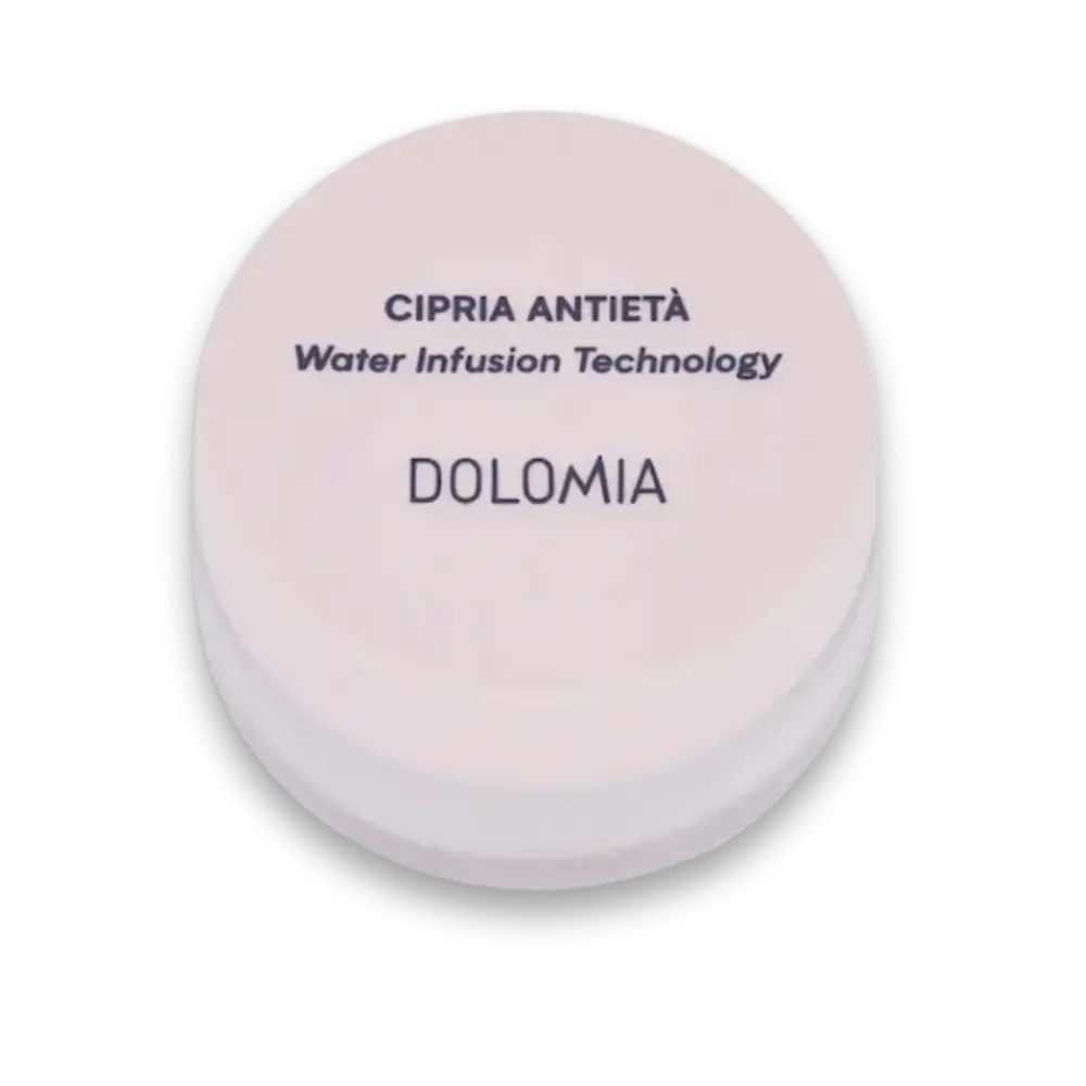 Runde rosafarbene Puderdose Dolomia Cipria Antietà mit Water Infusion Technology, geschlossen in Draufsicht.