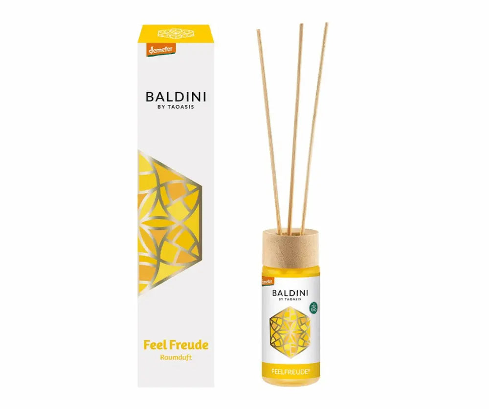 Baldini by Taoasis Feel Freude Raumduft mit gelber Flüssigkeit, Holzdeckel, Duftstäbchen und Demeter-Verpackung in der Vorderansicht