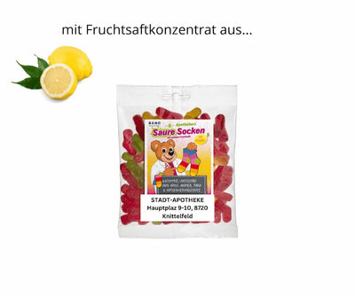 BANO Saure Socken Fruchtgummi im Beutel mit Vitamin C, glutenfrei und laktosefrei, daneben frische Zitrone
