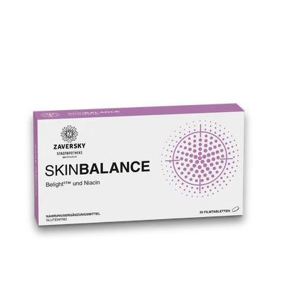 Zaversky SkinBalance Verpackung mit Belight3™ und Niacin, 30 Filmtabletten, lila-weißes Design mit Punktmuster.