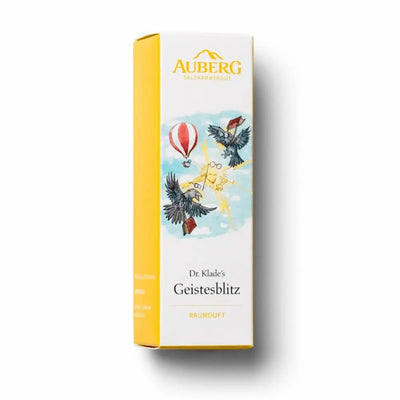 Gelb-weiße Verpackung von Auberg Dr. Klade's Geistesblitz Raumduft mit Illustration von Heißluftballon, Krähen und Sonne am Himmel.