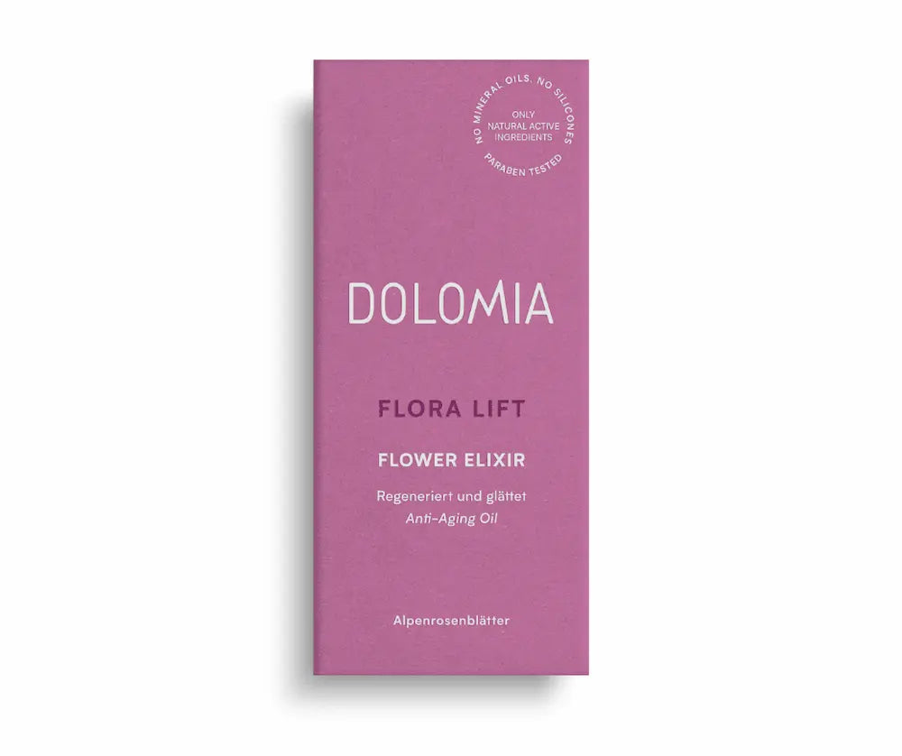 Pinke Faltschachtel Dolomia Flora Lift Flower Elixir Anti-Aging Oil mit Alpenrosenblättern, Vorderansicht