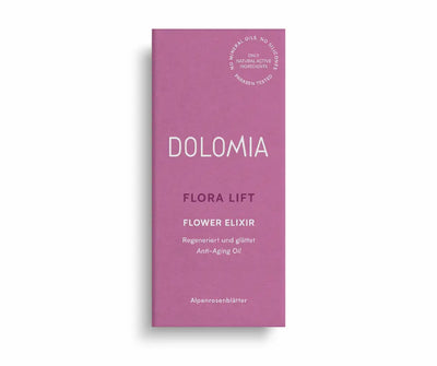 Pinke Faltschachtel Dolomia Flora Lift Flower Elixir Anti-Aging Oil mit Alpenrosenblättern, Vorderansicht