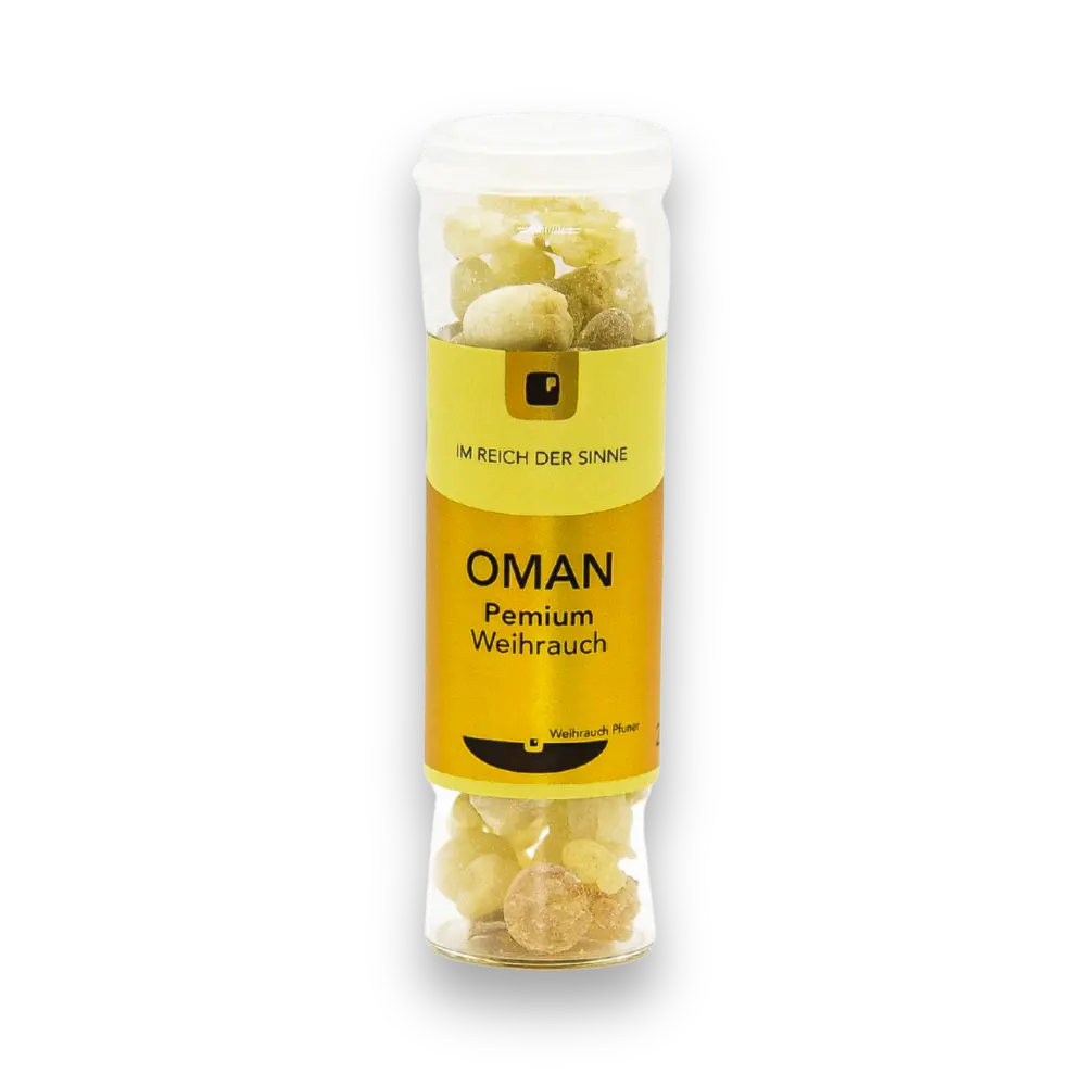 Transparentes Röhrchen mit cremefarbenen Weihrauch-Stücken und gelb-goldenem Etikett mit Aufschrift „OMAN Premium Weihrauch", Vorderansicht